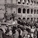 American troops roll Past Colosseum